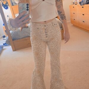 {American Eagle Outfitters} Cream Floral Flare Jeans
